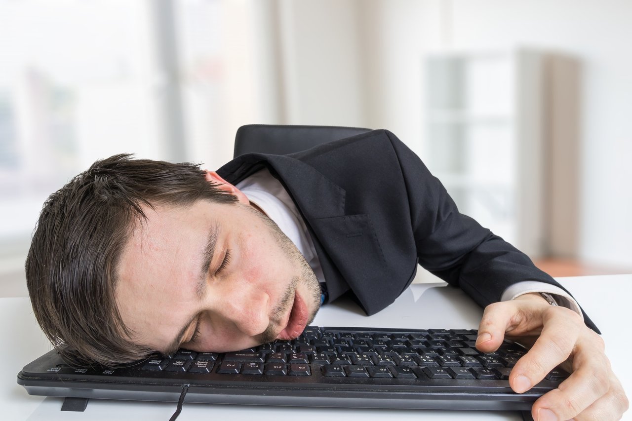 Man sleeping on keyboard