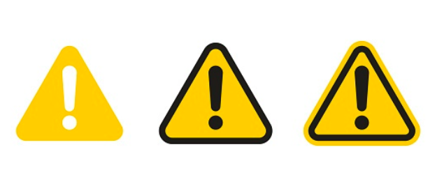 Three yellow triangle warning signs in a horizontal row