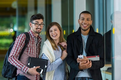 College students pose for a photo. Link goes to DOE's page on college preparation.