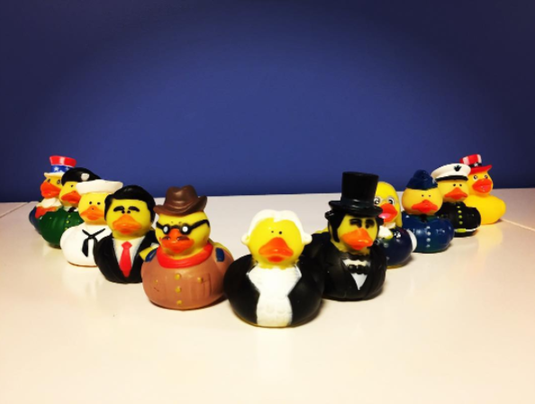 Two rows of rubber duckies featuring various U.S. Presidents throughout history. Takes you to USAGov's Instagram account.