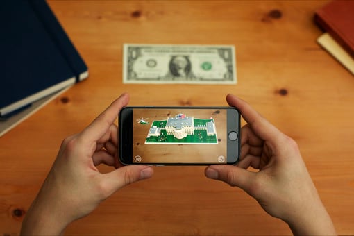 With the 1600 app, you can visit augmented reality with your phone and a dollar bill.